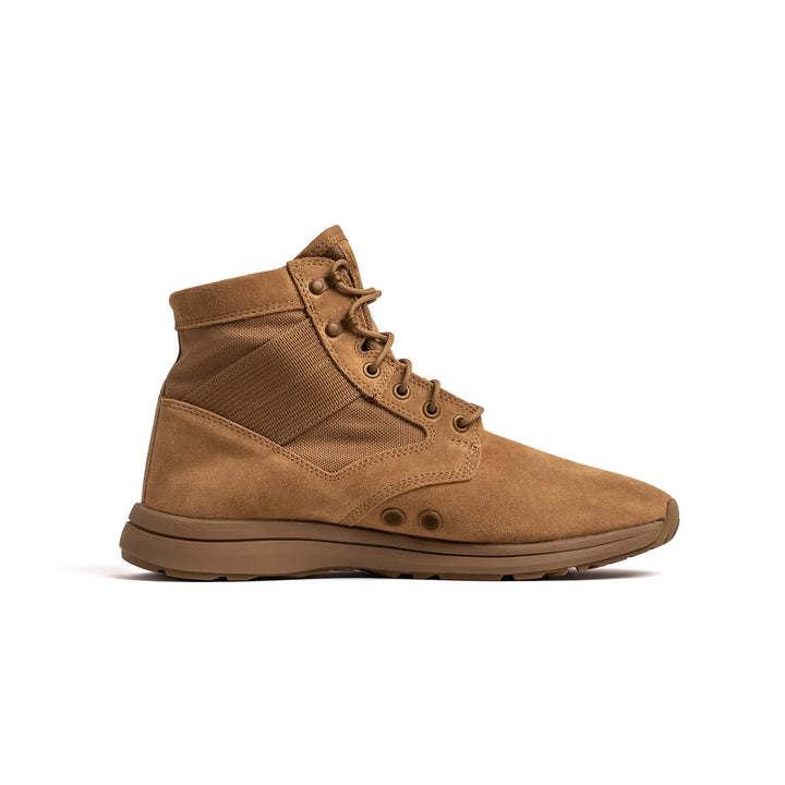 Side view of the MACV-1 Hi-Speed - Mid Top by GORUCK, a tan suede hiking boot with laces and a thick sole, featuring an EVA midsole for added comfort.