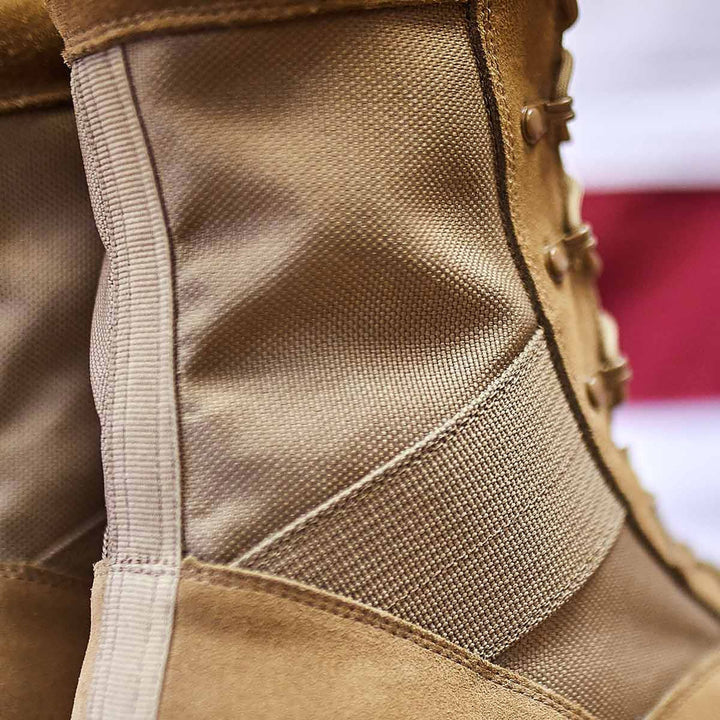 Close-up of the tan GORUCK MACV-1 Hi-Speed high top boots, featuring laces and a canvas texture, highlighting the detailed stitching and lightweight material.