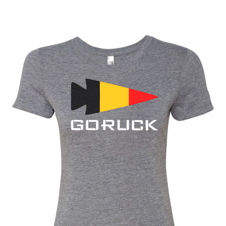 The Women's T-shirt - Rep Your Country by GORUCK EU features a gray design with a stylized spearhead logo in black, yellow, and red above the word "GORUCK," crafted from a premium tri-blend for ultimate comfort.