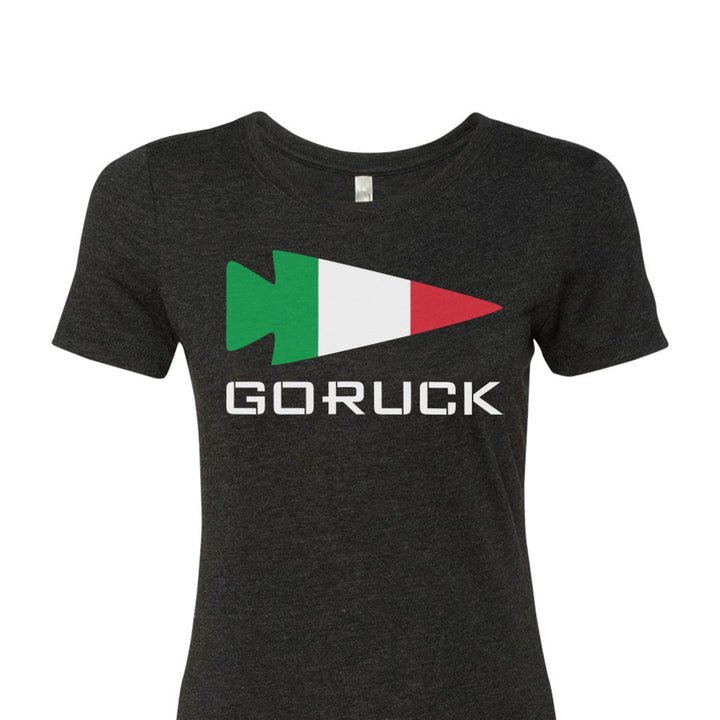 The Women's T-shirt - Rep Your Country by GORUCK EU is a high-quality tri-blend black tee, showcasing an arrow embellished with the Italian flag colors and "GORUCK" written beneath it, perfect for celebrating your home country.