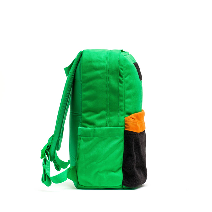 The KR1 2.0 - Kid Ruck by GORUCK is a sturdy children's backpack with reinforced stitching, highlighted by a side pocket in an orange and black color scheme, displayed from the side against a white background.