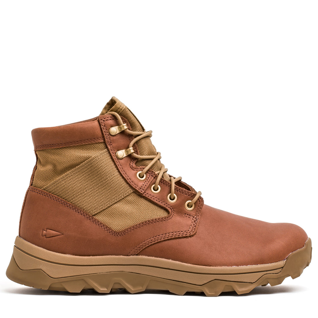 The GORUCK MACV-2 Mid Top in Briar and Coyote is a brown leather and fabric jungle boot with an aggressive triple compound outsole and tan sole, shown from the side on a white background.