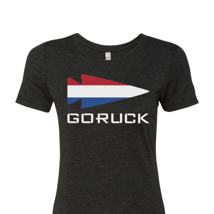 Embrace national pride with the Women's T-shirt - Rep Your Country by GORUCK EU. This classic tee, made from a premium tri-blend, showcases a bold red, white, and blue arrowhead design on a black background, with "GORUCK" prominently displayed underneath.