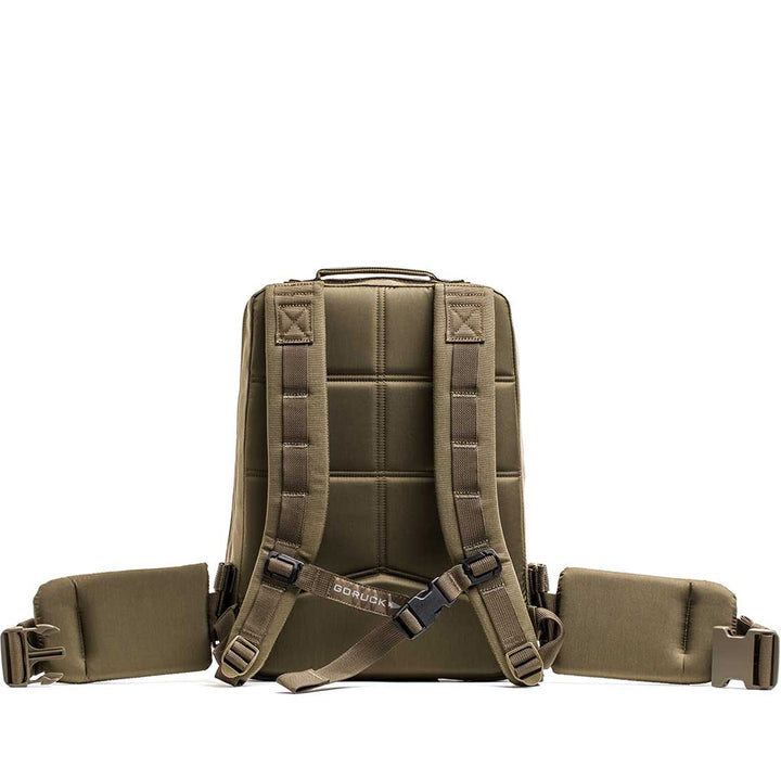 The GORUCK Rucker 4.0 is a khaki rucksack perfect for rucking, featuring padded straps, waist belts, and a quilted back design.