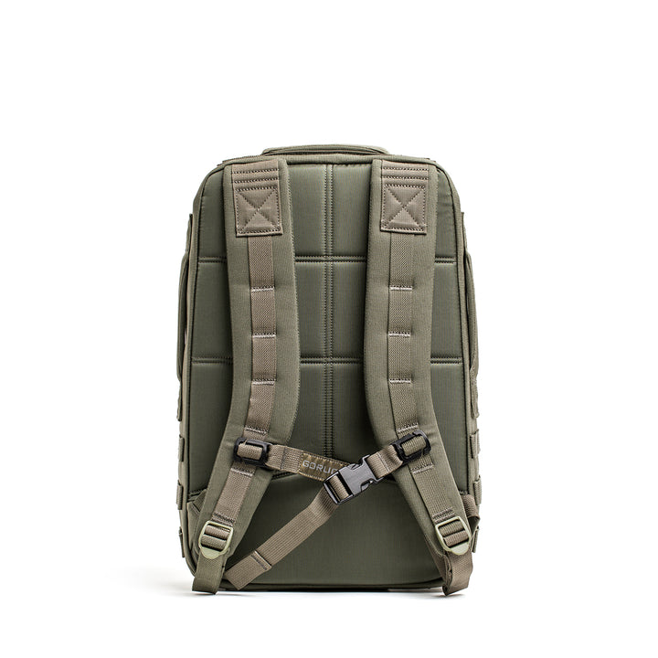 Olive green GORUCK Rucker 4.0 backpack with padded straps and waist belt, shown from the back.