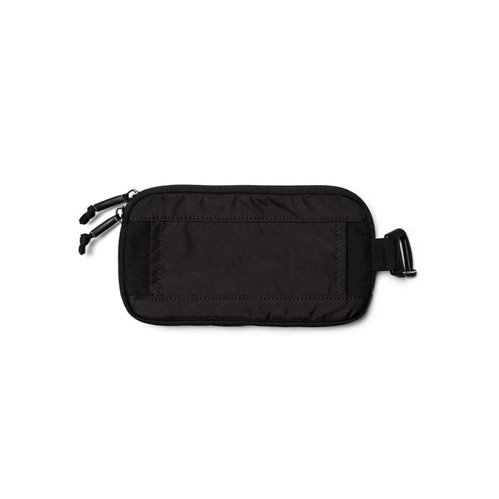 A black, rectangular GORUCK Sternum Pouch - Cordura with two zippers and a side strap clip shown against a white background. Designed to be compatible with MOLLE systems, this pouch offers a sleek, minimalist design ideal for your next rucker adventure.