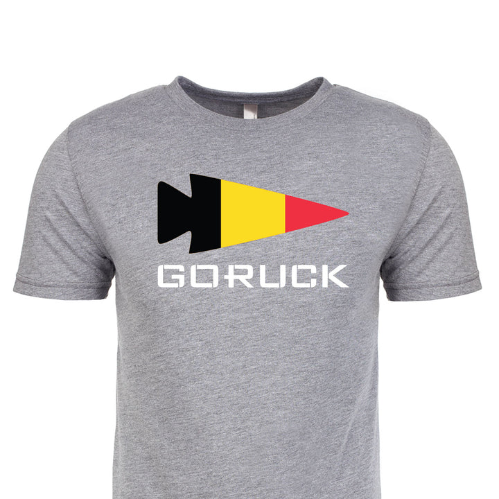 Gray premium tri-blend T-shirt from GORUCK EU, featuring a black, yellow, and red arrow shape above the text "Rep Your Country.