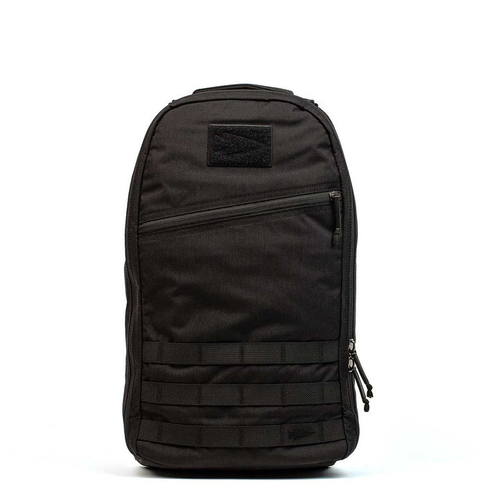 Meet the GORUCK Bullet Ruck Laptop - 16L backpack. It offers a sleek design with a bombproof laptop compartment, front zippered pocket, and horizontal straps for attachments. Enjoy enhanced comfort thanks to its optimal lumbar support—ideal for daily adventures.