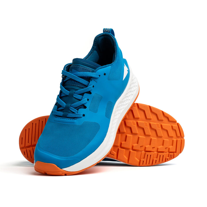 The Rough Runner - Electric Blue by GORUCK is showcased against a white background, highlighting its orange soles and versatile road-to-trail outsole, perfect for any adventure.