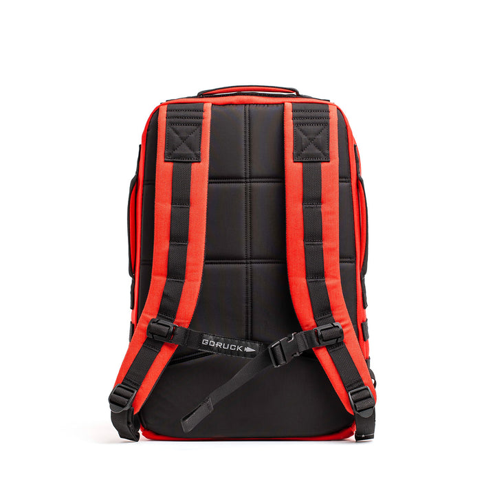 Black and red Rucker 4.0 by GORUCK, featuring padded straps and a prominent Rucker® logo on the back.