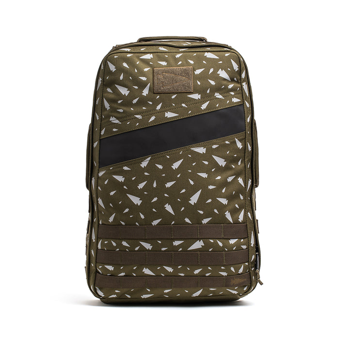 The olive green GORUCK Rucker 4.0 backpack showcases a bold triangle design and a stylish black diagonal stripe on the front, making it ideal for rucking adventures.