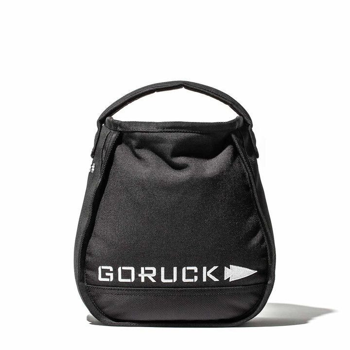 A GORUCK black gym bag with a handle showcases the brand's white logo text prominently on the front. Designed with Endurance Design, it conveniently holds your essentials, making it ideal for transporting your Sand Kettlebells. The bag is set against a white background.