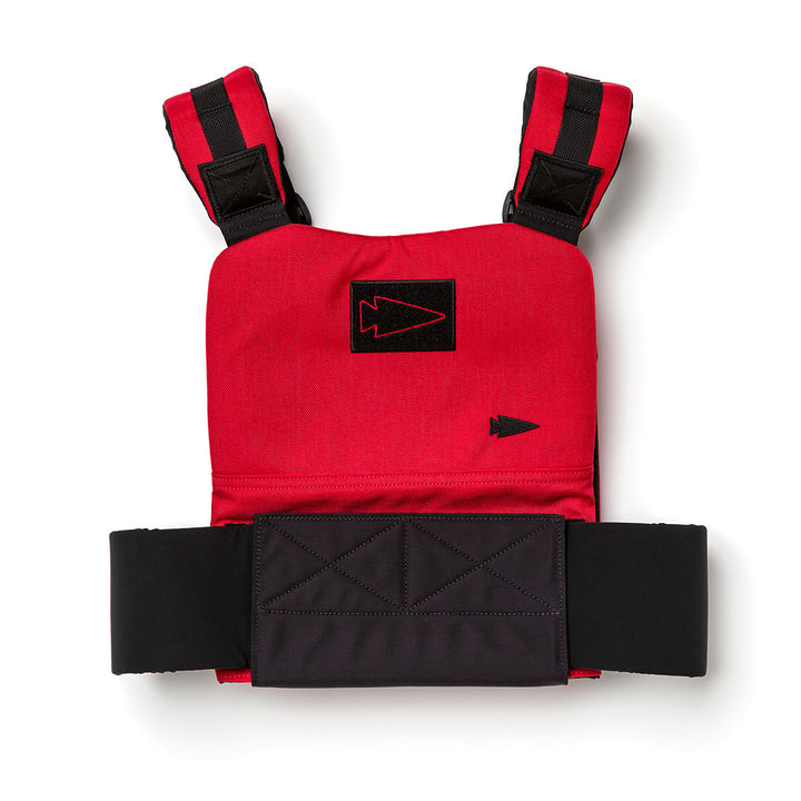 The Training Weight Vest 2.0 by GORUCK is a red and black tactical vest with adjustable straps, featuring an arrow logo on the front.